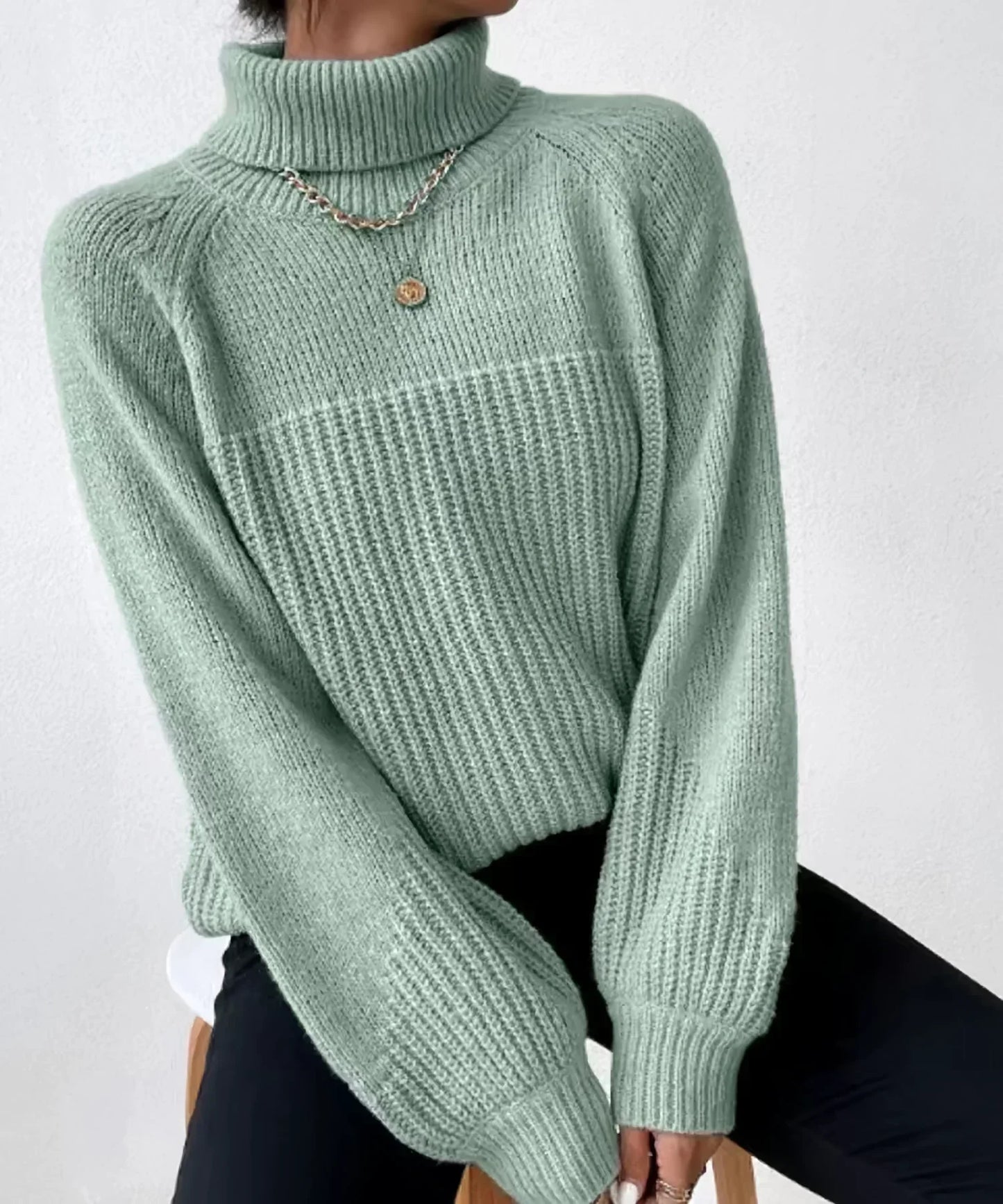 Malani - Elegante jersey de punto de cuello alto para mujer