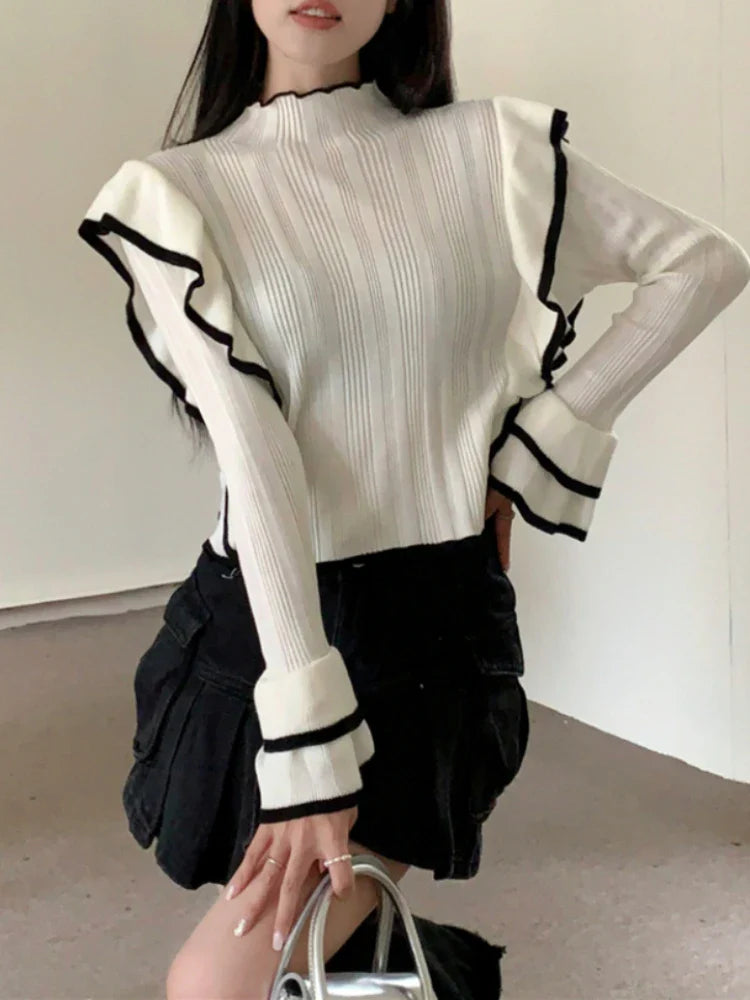 Qarina Sweater | Elegante jersey con volantes