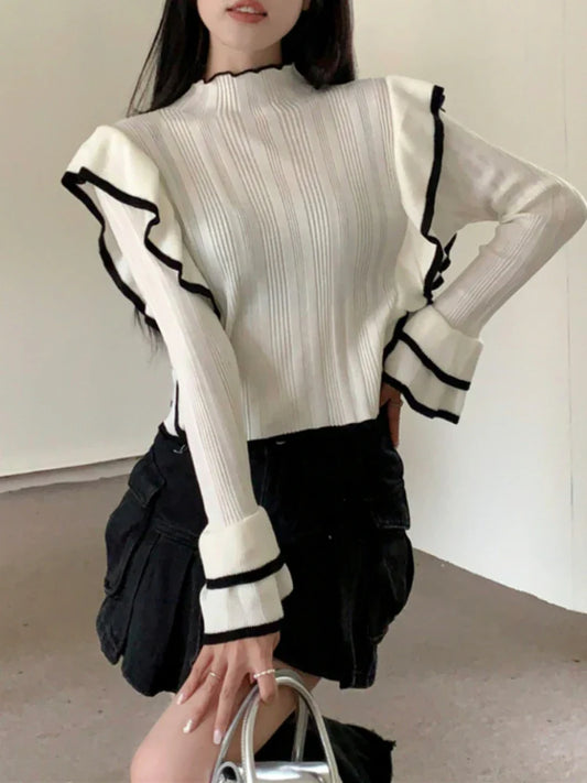 Qarina Sweater | Elegante jersey con volantes