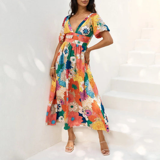 Vestido largo con estampado floral y mangas cortas abullonadas