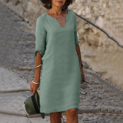 Elegante vestido clásico hasta la rodilla con mangas tres cuartos