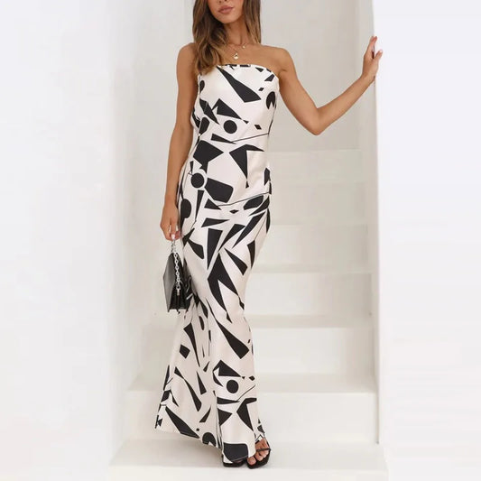 Maxi vestido ajustado al hombro con estampado geométrico