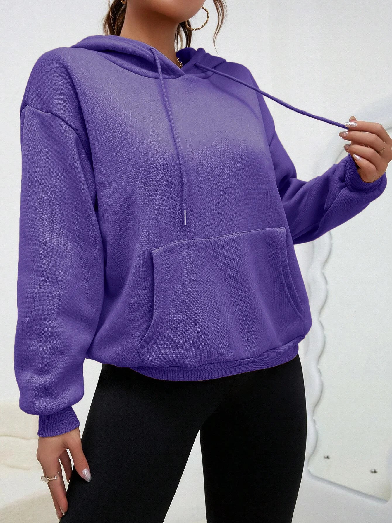 Dorte | Sudadera holgada con capucha y bolsillo para mujer