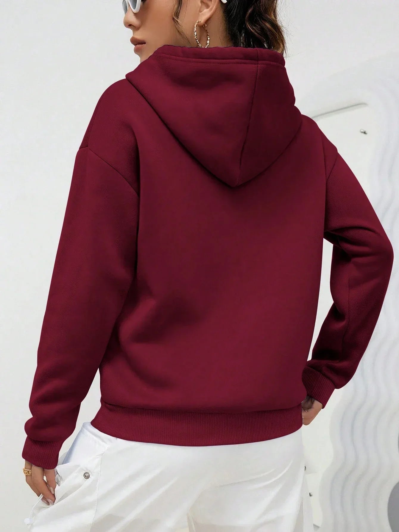 Dorte | Sudadera holgada con capucha y bolsillo para mujer