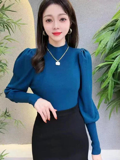 Blusa de cuello redondo y manga larga abullonada para mujer
