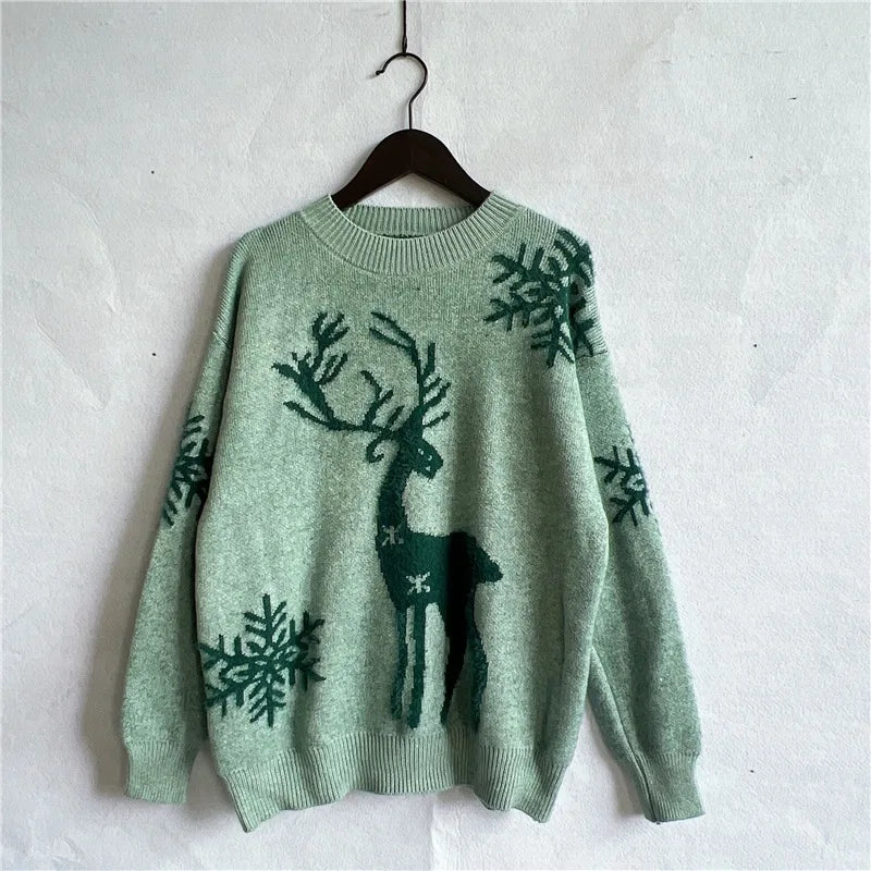 Manuela | Cálido jersey de punto con escote redondo y estampado de ciervos y copos de nieve para mujer