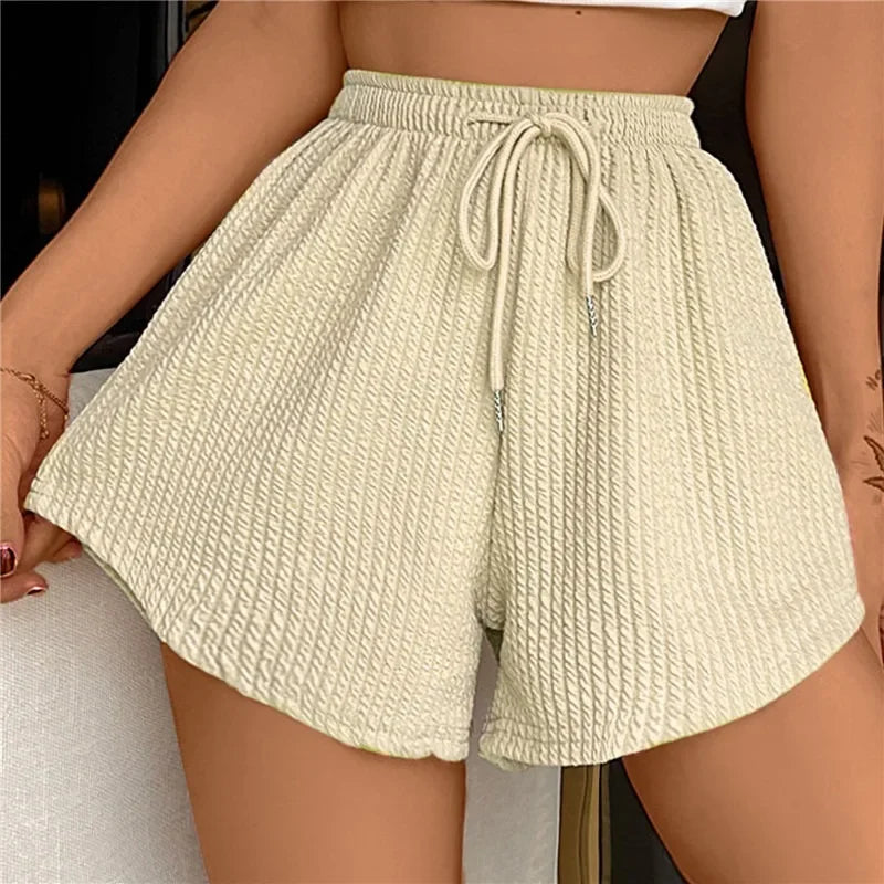 Pantalones cortos con cordón y perneras anchas