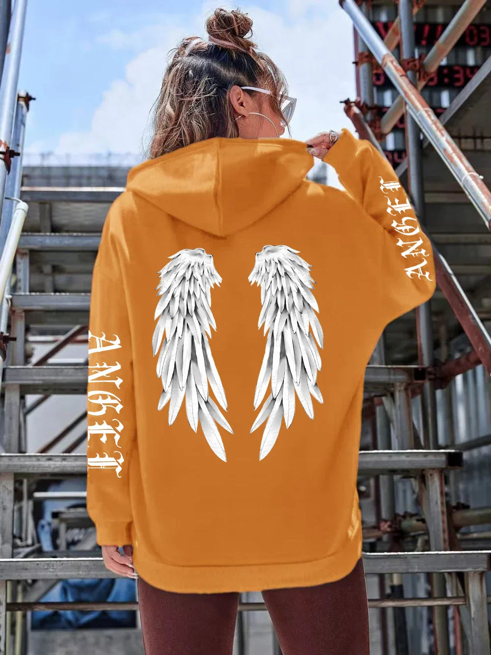 Heidi | Sudadera holgada con capucha y estampado de alas para mujer