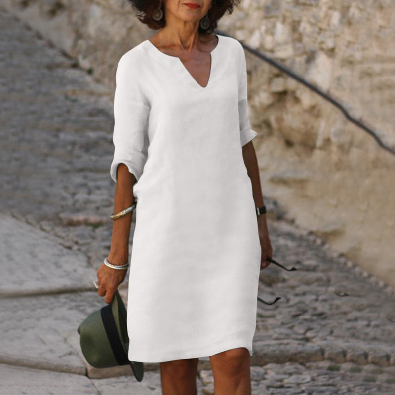 Elegante vestido clásico hasta la rodilla con mangas tres cuartos