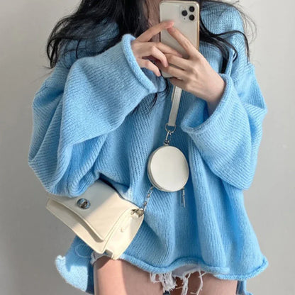 Rhea - cálido jersey suelto con cuello de pico