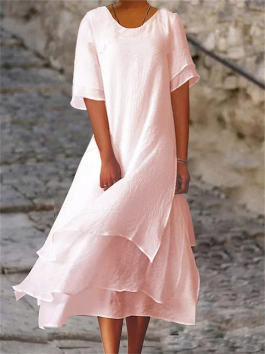 Vestido de doble capa con mangas cortas y escote redondo