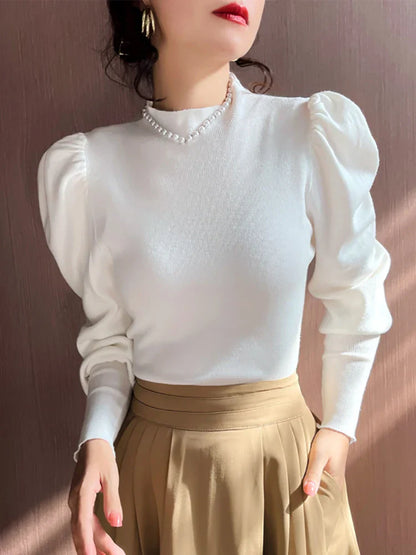 Blusa de cuello redondo y manga larga abullonada para mujer