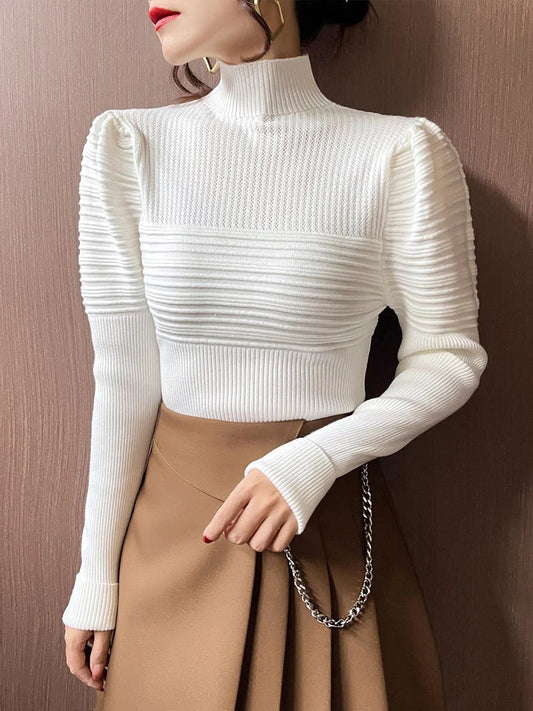 Mona | Jersey de punto de cuello alto con mangas abullonadas para mujer