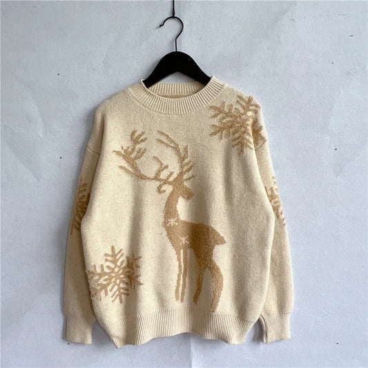 Manuela | Cálido jersey de punto con escote redondo y estampado de ciervos y copos de nieve para mujer