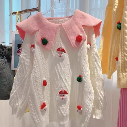 Hannes | Cálido jersey de punto con escote pop y figuras navideñas de ganchillo para mujer