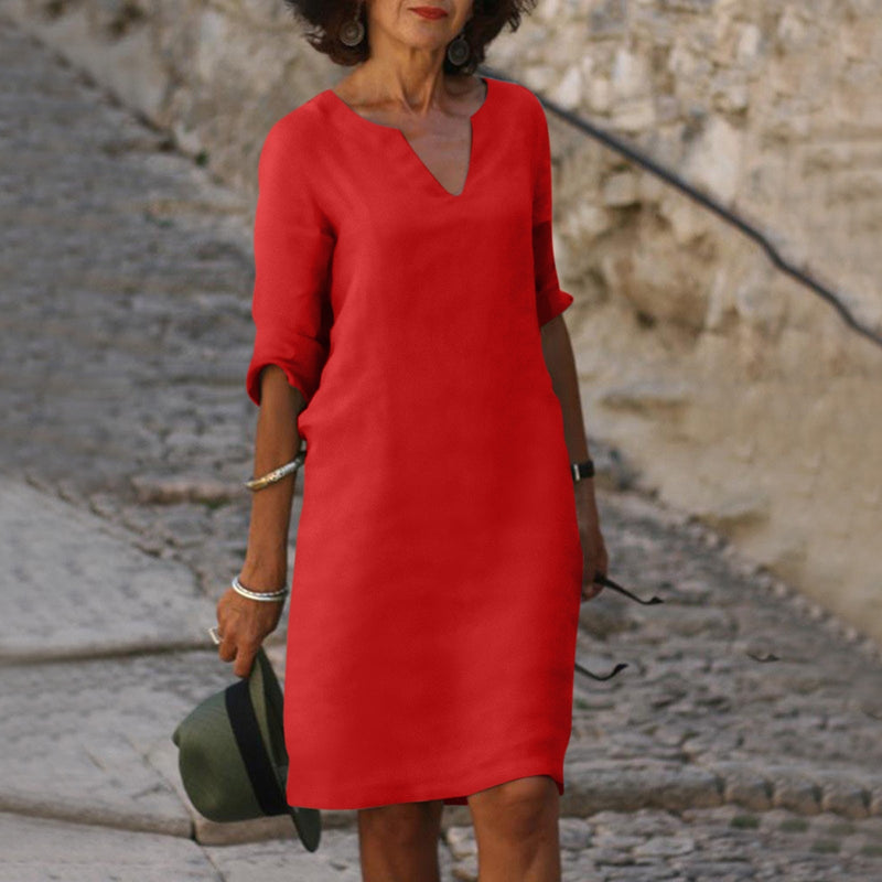 Elegante vestido clásico hasta la rodilla con mangas tres cuartos