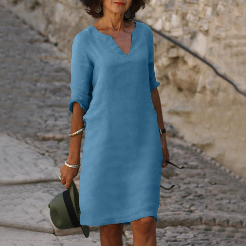Elegante vestido clásico hasta la rodilla con mangas tres cuartos