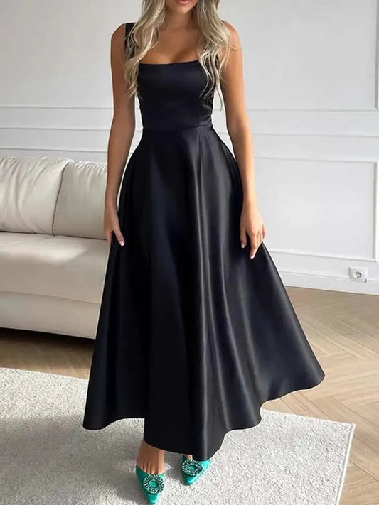 Vestido de noche midi con tirantes y falda amplia y elegante