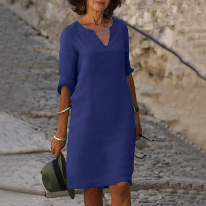 Elegante vestido clásico hasta la rodilla con mangas tres cuartos