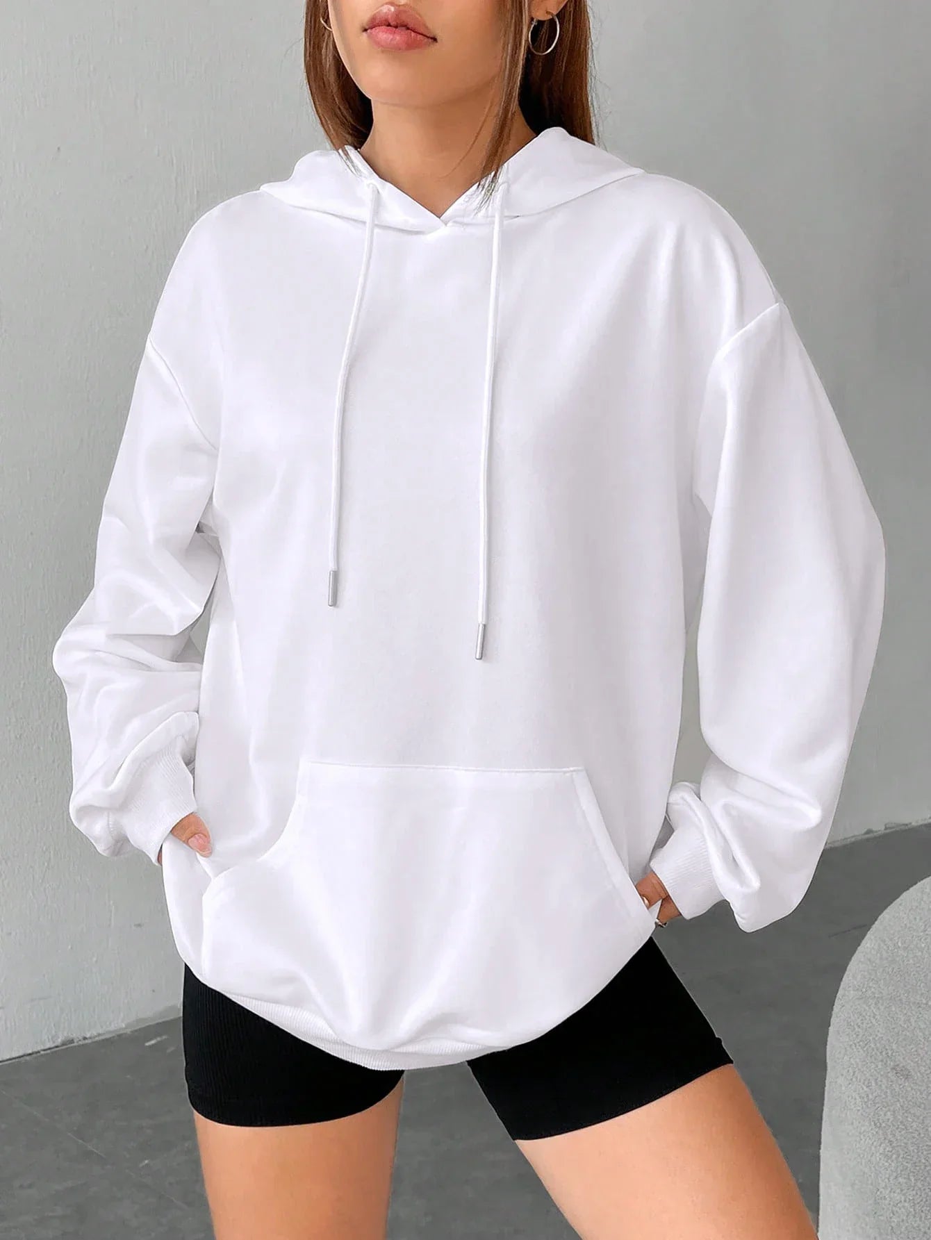 Dorte | Sudadera holgada con capucha y bolsillo para mujer