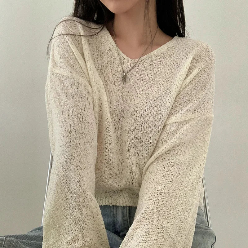 Top suelto de manga larga para mujer
