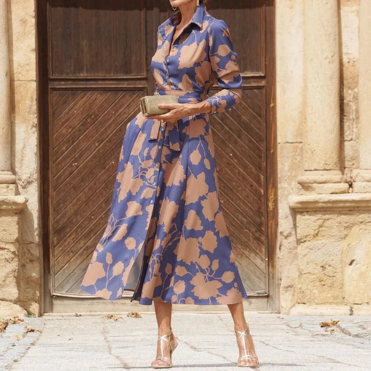 Elegante vestido largo con escote en V, mangas largas y cinturón