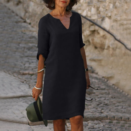 Elegante vestido clásico hasta la rodilla con mangas tres cuartos