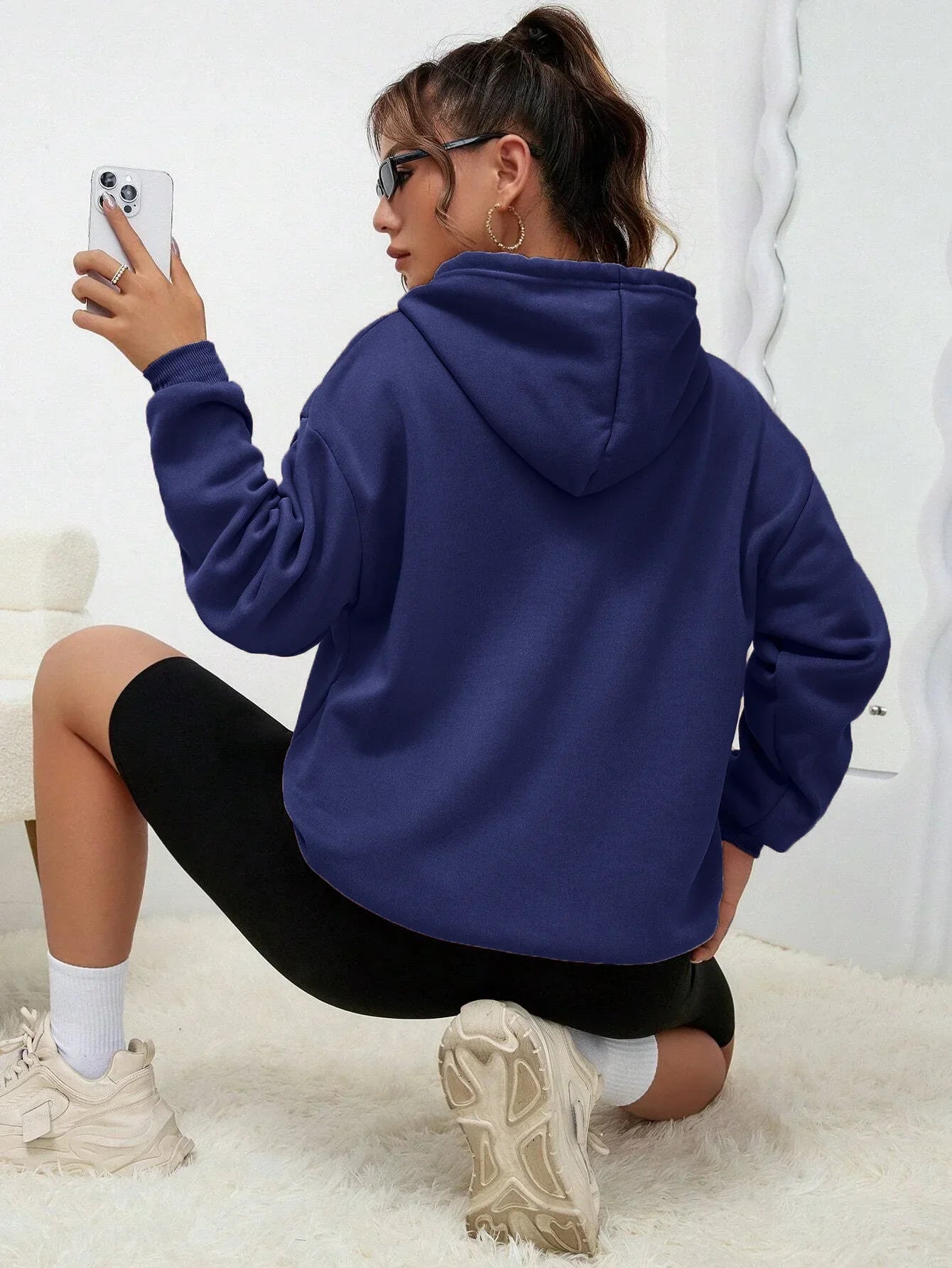 Dorte | Sudadera holgada con capucha y bolsillo para mujer