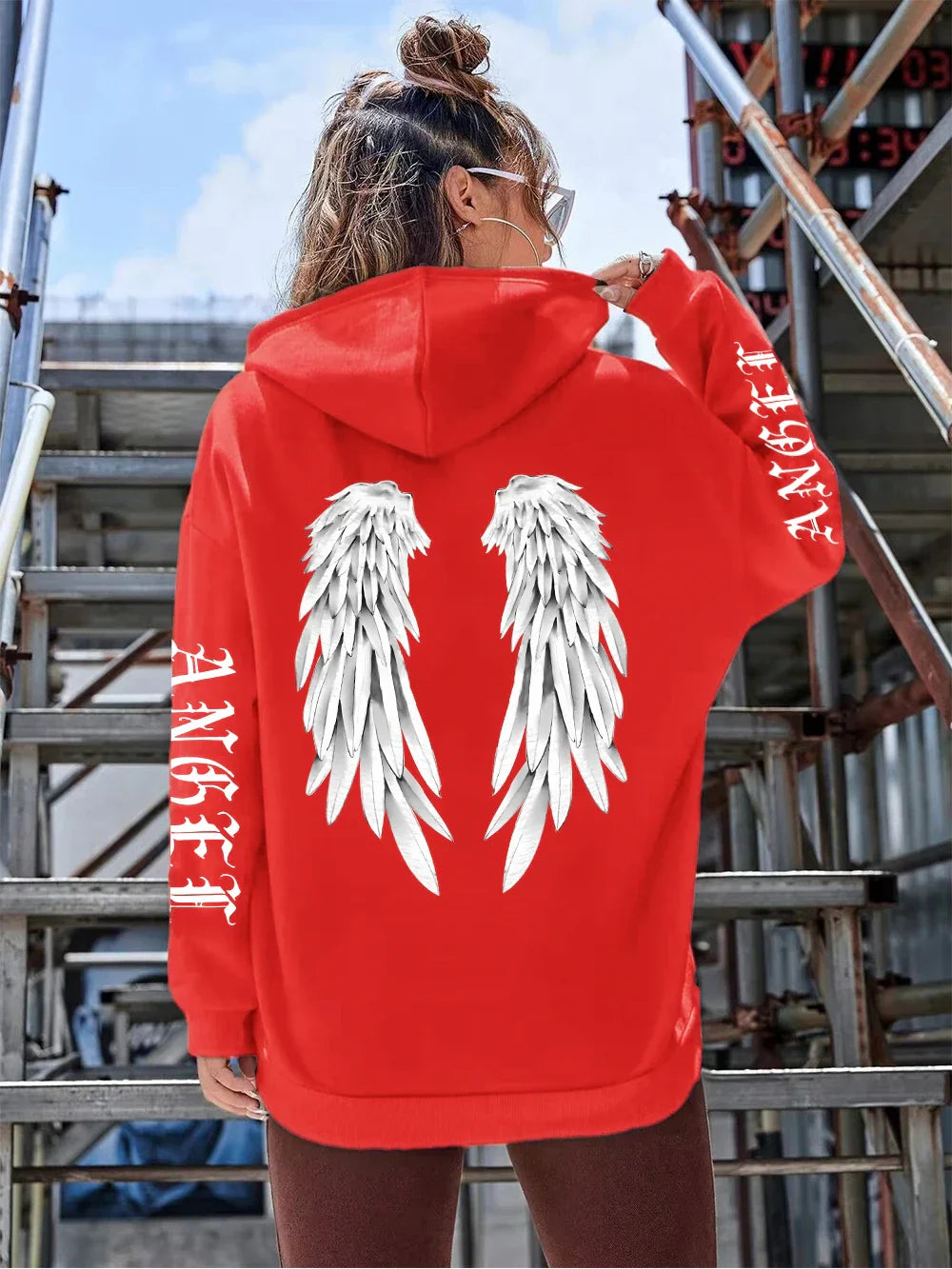 Heidi | Sudadera holgada con capucha y estampado de alas para mujer