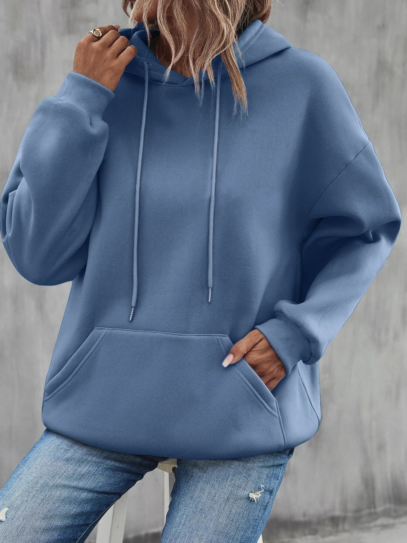 Dorte | Sudadera holgada con capucha y bolsillo para mujer