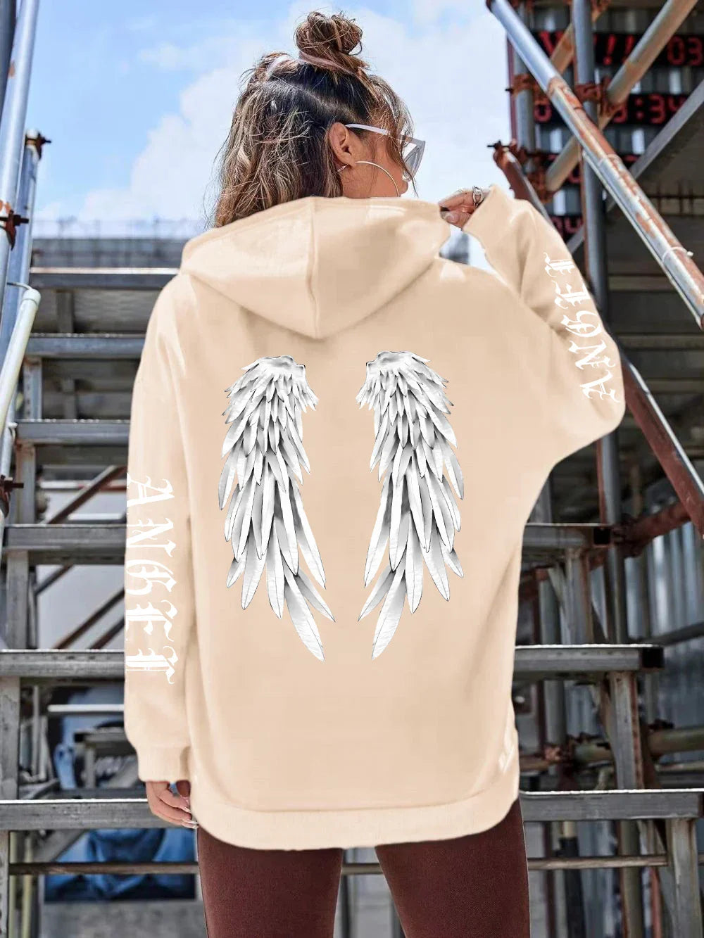 Heidi | Sudadera holgada con capucha y estampado de alas para mujer