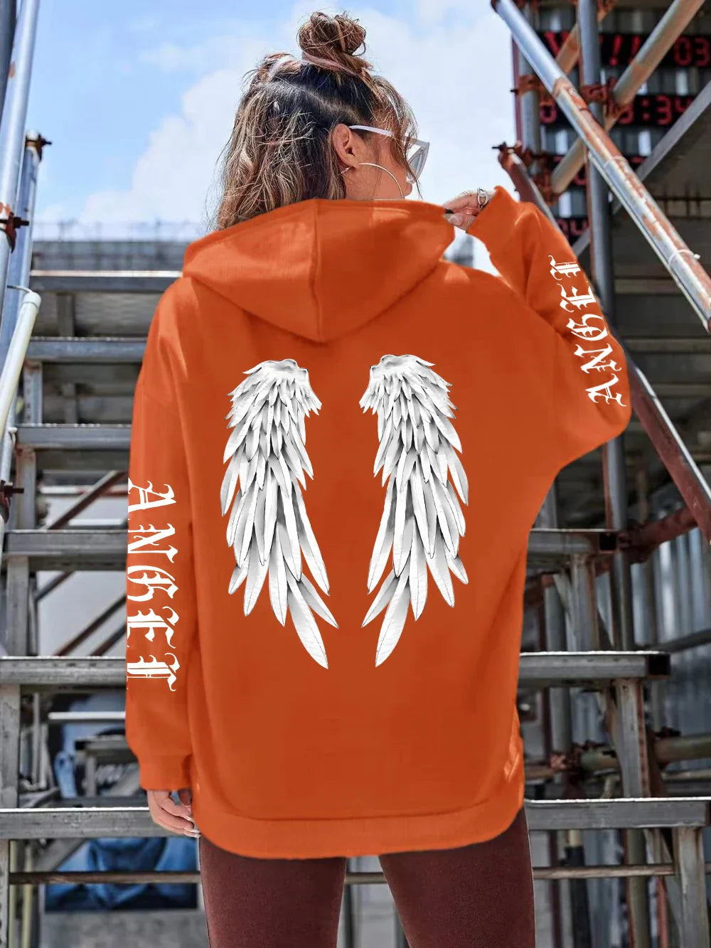 Heidi | Sudadera holgada con capucha y estampado de alas para mujer