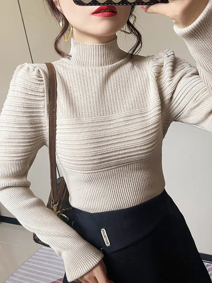 Mona | Jersey de punto de cuello alto con mangas abullonadas para mujer