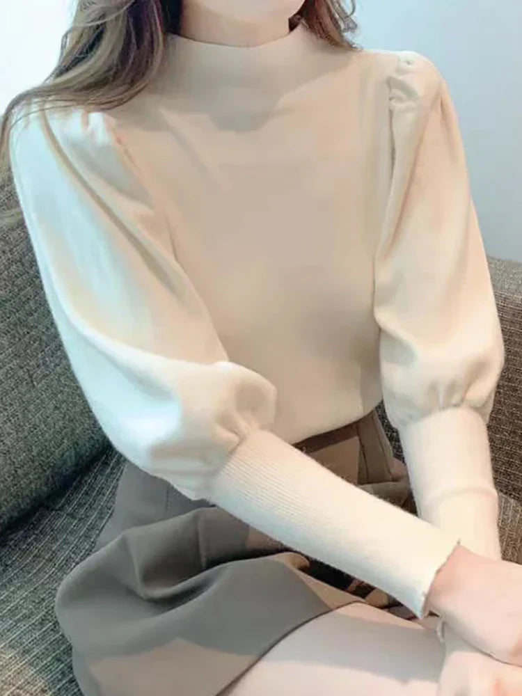 Blusa de cuello redondo y manga larga abullonada para mujer