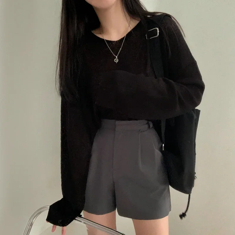 Top suelto de manga larga para mujer