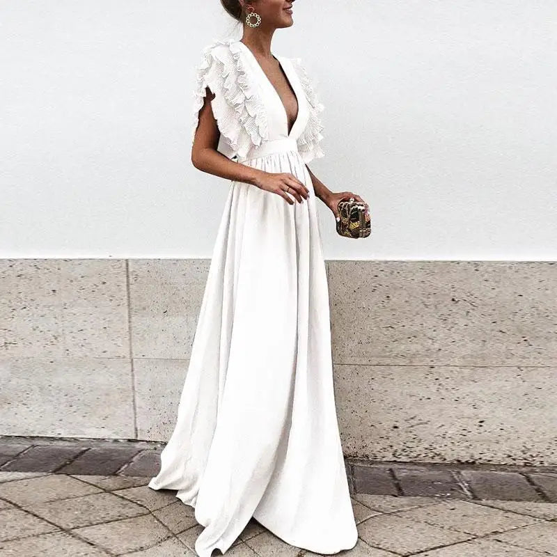 Elegante vestido largo con profundo escote y mangas cortas con volantes
