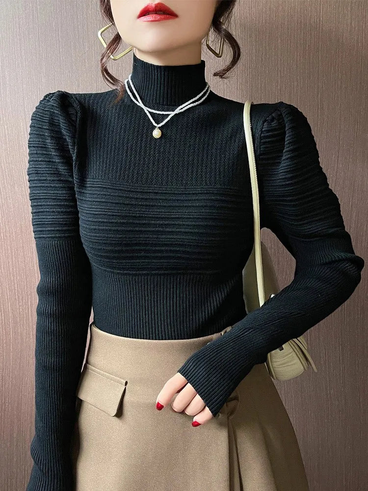 Mona | Jersey de punto de cuello alto con mangas abullonadas para mujer