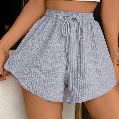 Pantalones cortos con cordón y perneras anchas