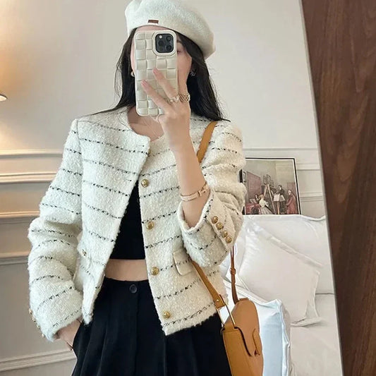 Elegante chaqueta corta de tweed
