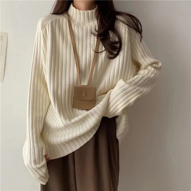Elegante jersey de cuello alto