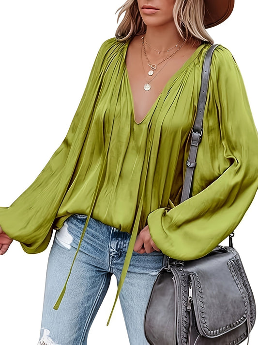 Blusa con cuello en V y manga farol - Diseño satinado y semitransparente