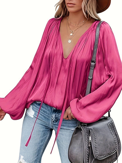 Blusa con cuello en V y manga farol - Diseño satinado y semitransparente