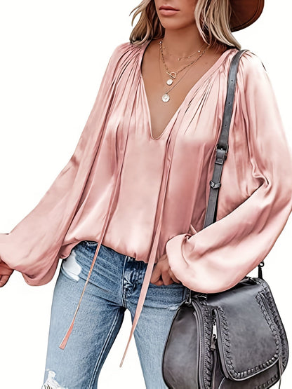 Blusa con cuello en V y manga farol - Diseño satinado y semitransparente