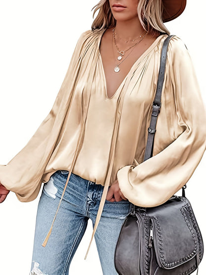 Blusa con cuello en V y manga farol - Diseño satinado y semitransparente