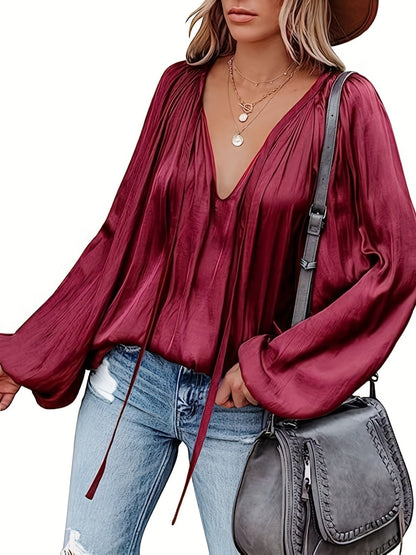 Blusa con cuello en V y manga farol - Diseño satinado y semitransparente