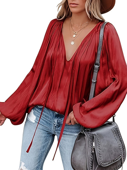 Blusa con cuello en V y manga farol - Diseño satinado y semitransparente