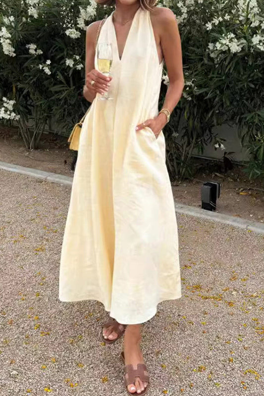 Vestido de línea A con cuello en V y prácticos bolsillos