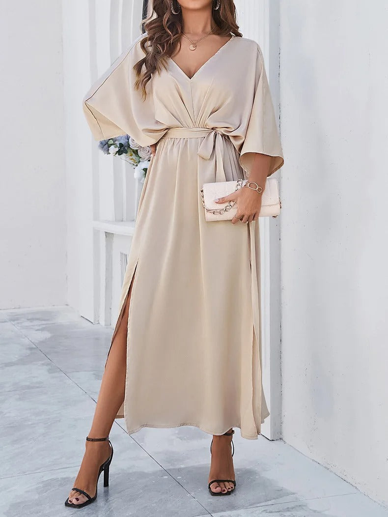 Elegante vestido largo con mangas murciélago y cinturón