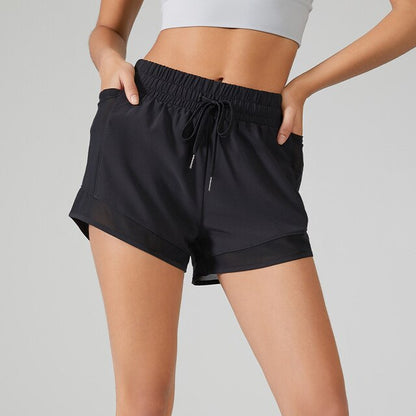 GOIE - Pantalones cortos deportivos