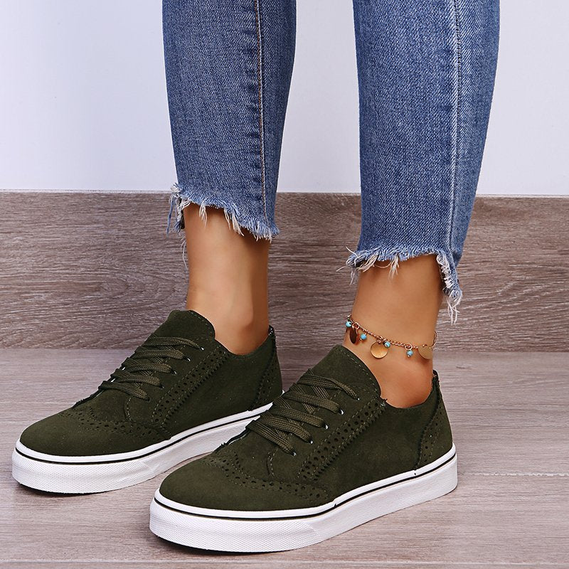 Elegantes zapatillas con cordones y suela plana